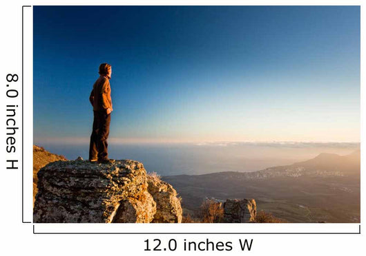 man on the cliff in mountains at sunset Wall Decal