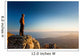 man on the cliff in mountains at sunset Wall Decal