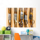 close up of a row of guns displayed in gun shop Wall Decal
