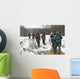 Group of hunters walking on the field in winter Wall Decal
