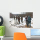 Group of hunters walking on the field in winter Wall Decal