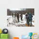 Group of hunters walking on the field in winter Wall Decal