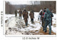 Group of hunters walking on the field in winter Wall Decal