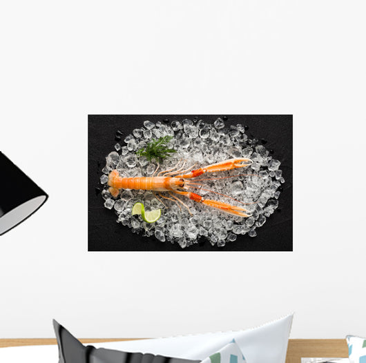 Fresh scampi shrimp on ice on a black stone table top view Wall Decal