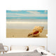 Conch shell on beach Wall Decal