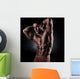 a young and fit male model posing his muscles Wall Decal