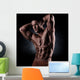 a young and fit male model posing his muscles Wall Decal