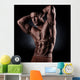 a young and fit male model posing his muscles Wall Decal