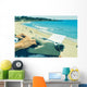 young man typewriting on the beach Wall Decal