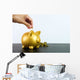 Putting coin into piggy bank Wall Decal
