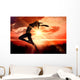 Composite image of side view of a sporty young woman stretching Wall Decal