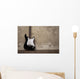 Black guitar near the wall Wall Decal