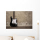 Black guitar near the wall Wall Decal