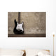 Black guitar near the wall Wall Decal