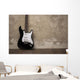 Black guitar near the wall Wall Decal