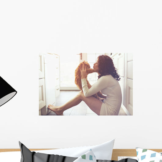 Girl playing with cat Wall Decal
