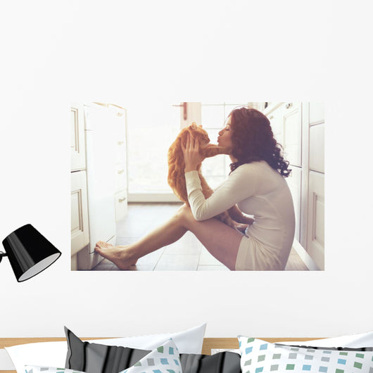 Girl playing with cat Wall Decal