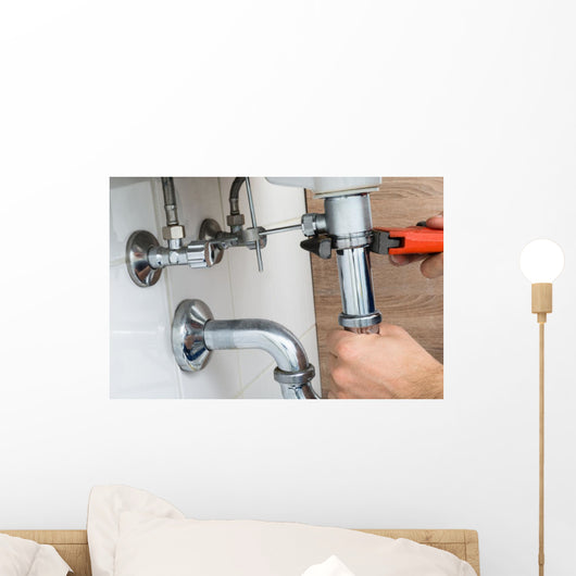 Male Plumber Fixing Sink In Bathroom Wall Decal