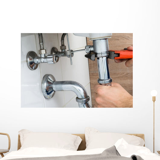Male Plumber Fixing Sink In Bathroom Wall Decal