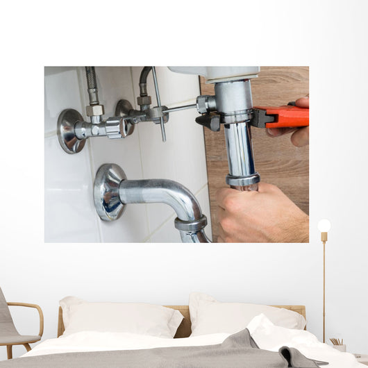Male Plumber Fixing Sink In Bathroom Wall Decal