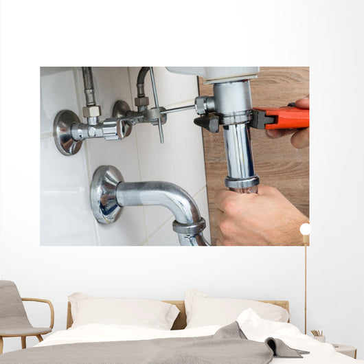 Male Plumber Fixing Sink In Bathroom Wall Decal