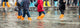 Close Up of legs with boots due to the high water in Venice. Wall Decal