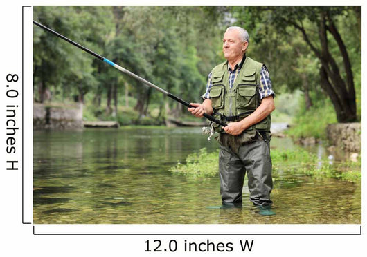 Cheerful mature fisherman fishing in a river Wall Decal
