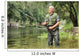 Cheerful mature fisherman fishing in a river Wall Decal