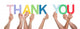 Close-up Of Hands Holding The Word Thank You Wall Decal