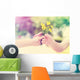 Elderly and young woman holding flowers outside Wall Decal