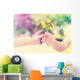 Elderly and young woman holding flowers outside Wall Decal