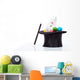 Cute white rabbit with colorful easter eggs in magician hat Wall Decal