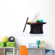 Cute white rabbit with colorful easter eggs in magician hat Wall Decal