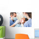 Dentist and Dental Assistant examining Patient teeth. Wall Decal