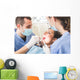 Dentist and Dental Assistant examining Patient teeth. Wall Decal