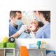 Dentist and Dental Assistant examining Patient teeth. Wall Decal