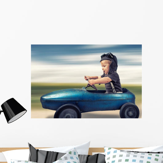 kleiner Junge im Tretauto Wall Decal