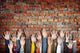 Group of Diverse Casual People's Hands Raised Concept Wall Decal