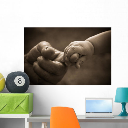 Baby hand holding mother finger with retro effect Wall Decal