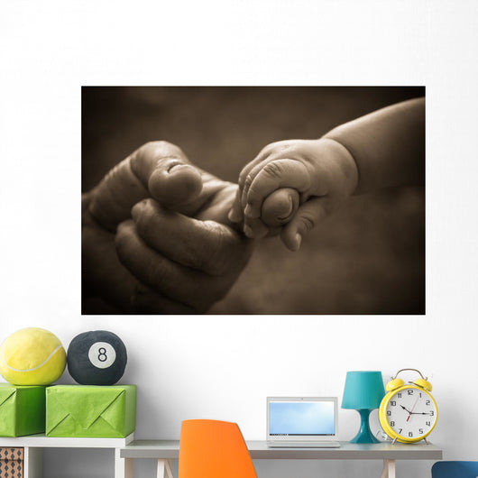 Baby hand holding mother finger with retro effect Wall Decal