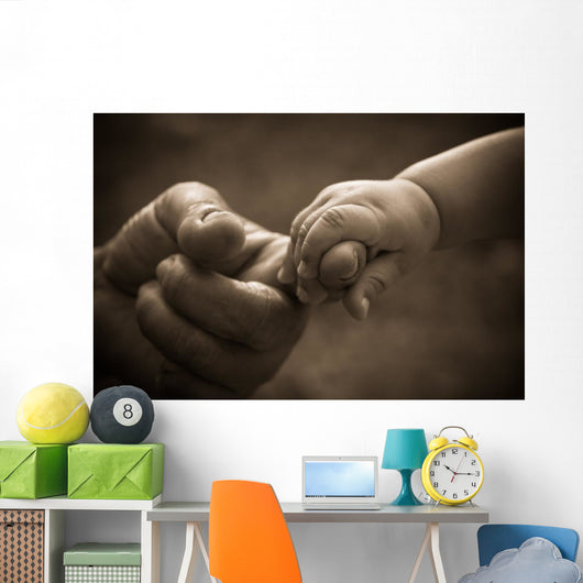 Baby hand holding mother finger with retro effect Wall Decal