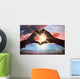 Composite image of couple making heart shape with hands Wall Decal