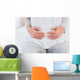Mid section of woman with stomach pain Wall Decal
