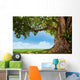 pring meadow with big tree with fresh green leaves Wall Decal