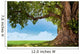 pring meadow with big tree with fresh green leaves Wall Decal