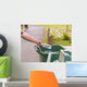 Hand throwing bottle in trash cans Wall Decal