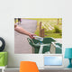 Hand throwing bottle in trash cans Wall Decal