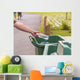 Hand throwing bottle in trash cans Wall Decal