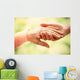 Old and young holding hands on light background, closeup Wall Decal