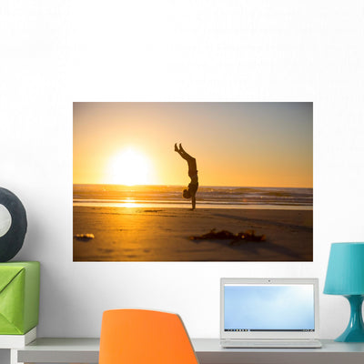 Handstand By The Beach Wall Decal shown on a wall